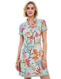 Woman wearing a floral dress by a poolside
