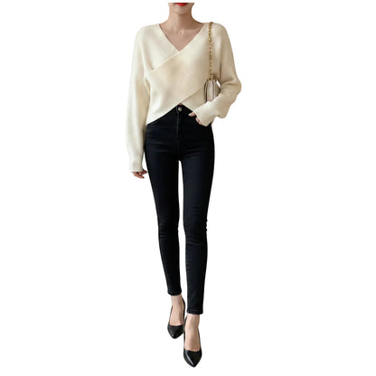 Women's loose fit knit sweater in Black back view